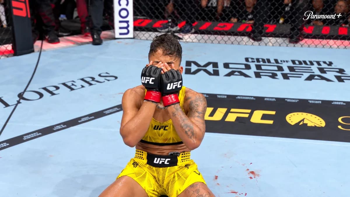 Iasmin Lucindo se cubre el rostro con los guantes tras vencer a Nicolle Caliari en UFC 333.